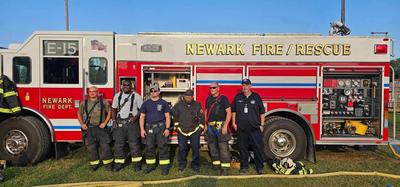 Firefighters in front of truck 2