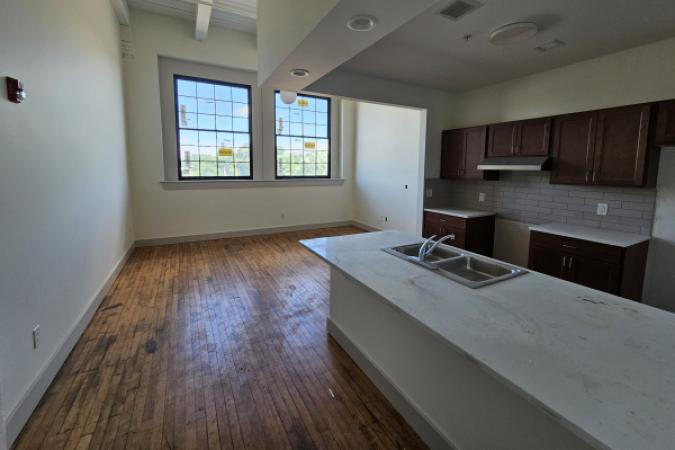 Coventry Commons living room and kitchen in one bedroom apt 6.23.26