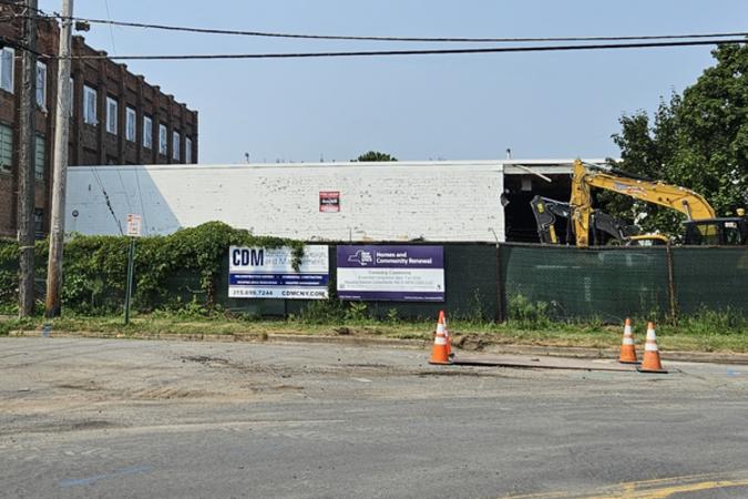 132 Harrison St Coventry Commons white building with side knocked down