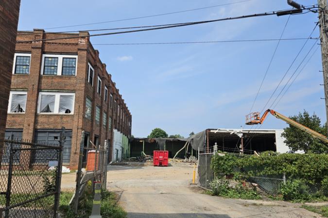 White Loading Dock Structure being taken down 132 Harrison St. Coventry Commons
