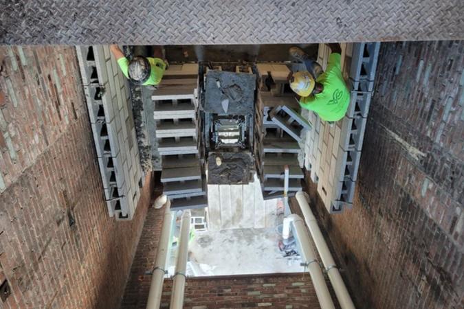 Men Working in shaft at Coventry Commons 132 Harrison St
