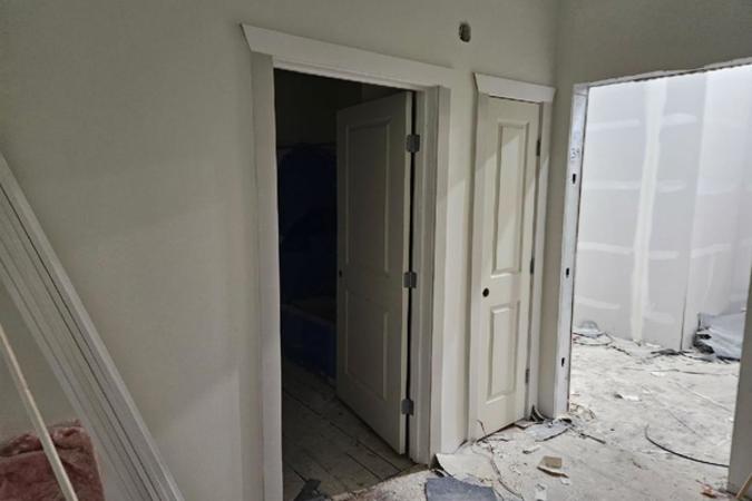 132 Harrison -Coventry Commons Door and drywall inside view